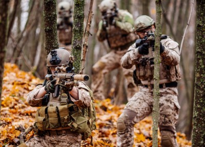 Soldiers wearing tactical goggles, body armor and ballistic helmets