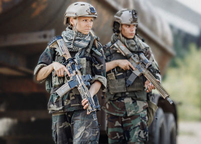 Soldiers wearing body armor plate carriers